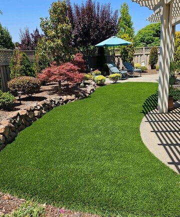 After artificial grass is installed in a backyard in Lincoln, CA Placer County