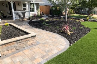 Artificial lawn grass, paver pathway and garden wall installation in Rocklin, CA